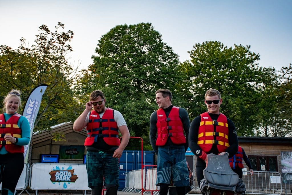 Four people wearing equipment at the bewl water aqua park